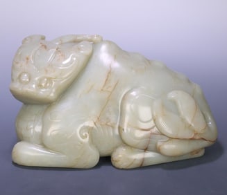 A Qing Dynasty Hetian jade beast ornament