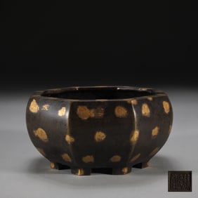 A Ming Dynasty copper tire gold-sprinkled octagonal furnace