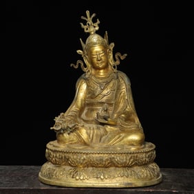 A bronze gilt lotus flower statue