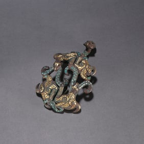 A piece of Han copper file gold and silver inlaid turquoise dragon hook