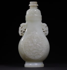 A Qing Dynasty dragon and phoenix auspicious lid vase is rewarded
