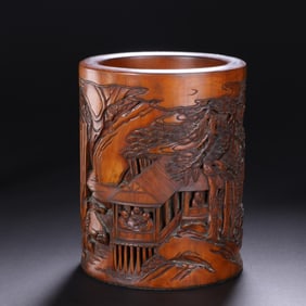 A Qing Dynasty sea three boxwood carved landscape character pattern pen holder
