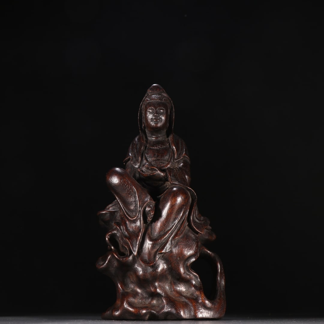 A statue of Guanyin with agarwood: Agarwood Guanyin statue SIZE: H:21.5cm W:10.2cm W:200g (The Dimensions Of All Batches Are Manually Measured.If You Need More Detailed Information, Please Contact Our Customer Service Before Bidding.)