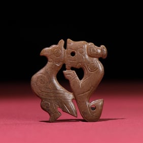 A Han Dynasty Manqin dragon and phoenix auspicious jade pendant