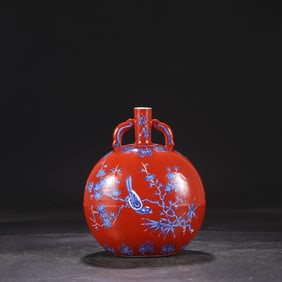 A Ming Dynasty Yongle red ground blue and white broken branches flower and bird pattern moon