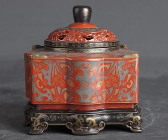 A Qing Qianlong bronze coral red floor incense burner
