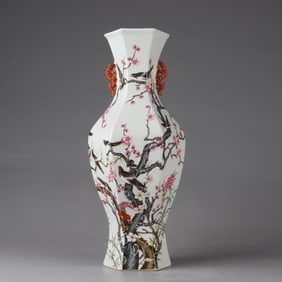 A Qing Qianlong pastel happy frieze hexagonal bottle