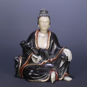A late Qing Dynasty rosewood inlaid Shoushan stone Guanyin ornament