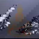 A late Qing Dynasty rosewood inlaid Shoushan stone Guanyin ornament