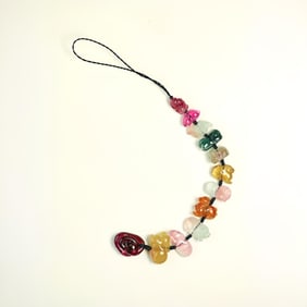 A multi-colored tourmaline zodiac pendant