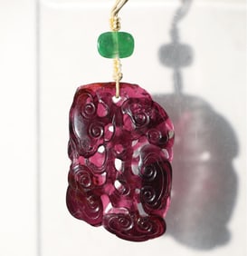 A Qing Dynasty rubellite carved Ganoderma lucidum pendant