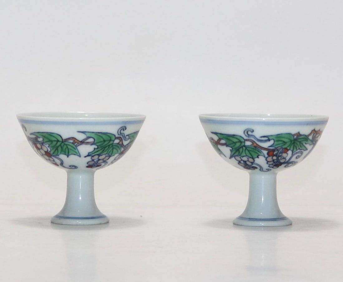 A pair of Ming Chenghua year Doucai grape pattern goblets (1 of 8)