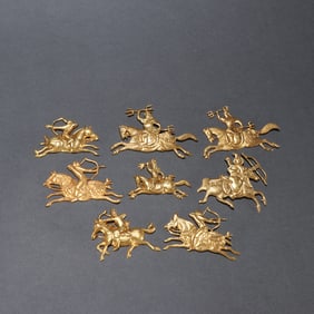 A set of Liao gold silver gilt cavalry carvings