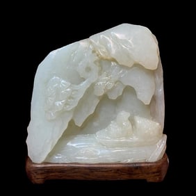 A white jade mountain ornament from the Qing Dynasty