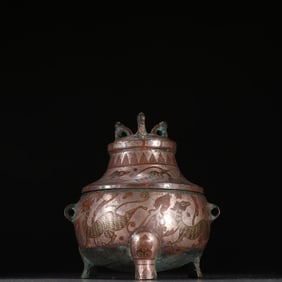 A Han copper file gold and silver beast pattern cover furnace