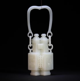 A white jade Eight Immortals Celebration Double Vase from the Qing Dynasty