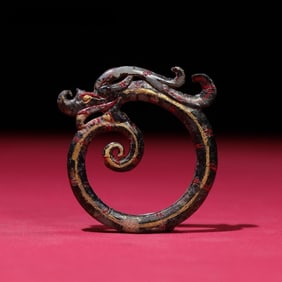 A large lacquer painted jade dragon of the Han Dynasty