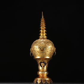 A Liao gold copper gilt lion earring relic pagoda