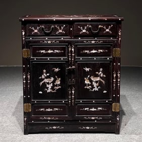 A rosewood inlaid shell double cabinet
