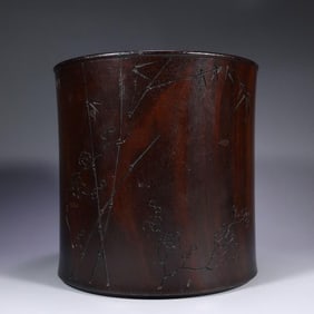 A mahogany carved bamboo pen holder