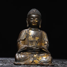 A bronze rubbing statue of Shakyamuni Buddha