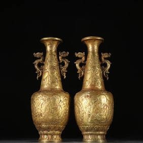 A pair of Tang copper gilt double dragon ear Buddha pattern clean bottles