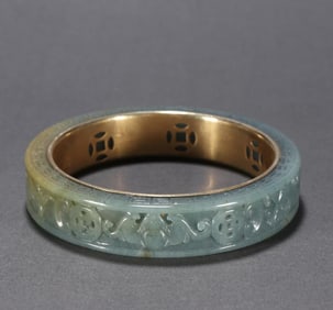 A clear jade golden bracelet in front of you