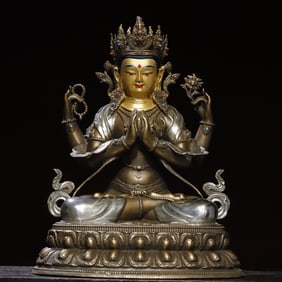 A bronze gilt painting four-armed Guanyin statue