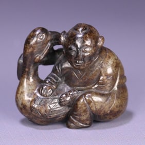 A piece of Hetian jade boy goose carving