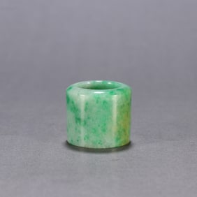 A piece of clear jade finger