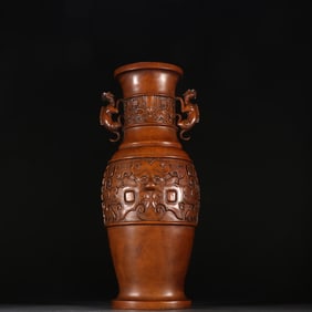 A Qing boxwood carved animal face pattern amphora