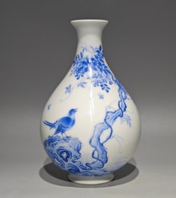 A Qing Yongzheng emerald blue flower and bird poetry jade pot spring vase
