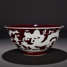 A Ming Xuande Jihong white dragon pattern bowl