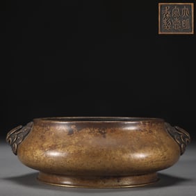 A Ming Dynasty copper tire chicken ear stove
