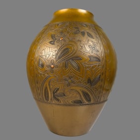 A vintage bronze bohemian vase with silver inlaid in silver