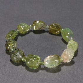 A clear tourmaline rabbit shaped bracelet