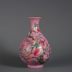 A Qing Yongzheng year rouge powder ground enamel color three multi-pattern jade pot spring vase