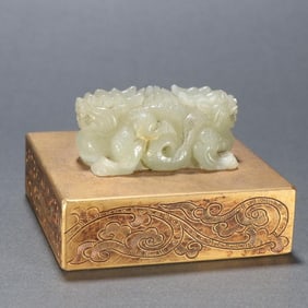 A copper-gilt inlaid jade dragon button seal