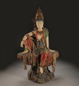 A Qing Dynasty camphor wood painted statue of Guanyin in the water moon