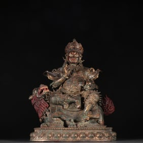 A bronze gilt treasure king statue