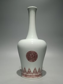 A glazed red zigzag rattle statue made in the Kangxi period of the Qing Dynasty