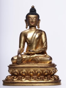A seated statue of Shakyamuni Buddha in copper gilt in the Qing Dynasty