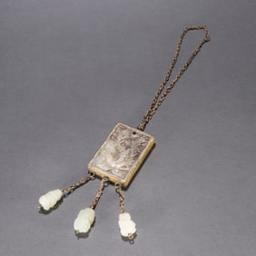 A Liao gold Hetian jade-wrapped gold phoenix pattern ornament