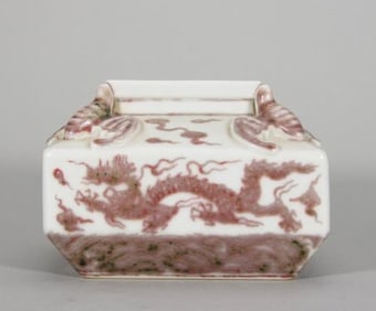 A Ming Xuande glaze red sea dragon pattern square wash