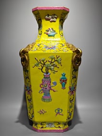 A piece of Qianlong year pastel yellow ground secretly carved with carved eight treasure flowers