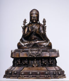 A seated statue of the Qing Dynasty alloy bronze guru "Sakya Pandita"
