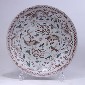 A pastel phoenix and dragon pattern plate from the Qing Dynasty