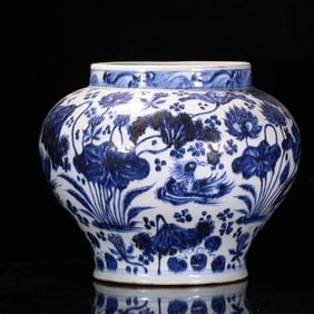 An early Ming Dynasty blue and white mandarin duck playing water jar