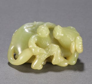 A Qing Hetian topaz boy cow ornament