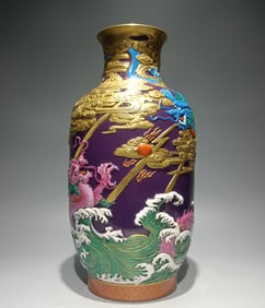 A Qing Qianlong model enamel purple carved fish leaping dragon gate winter melon bottle